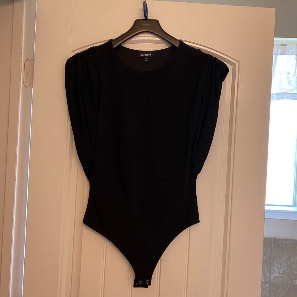 Black Express thong bodysuit with trendy shoulder pads.  🖤